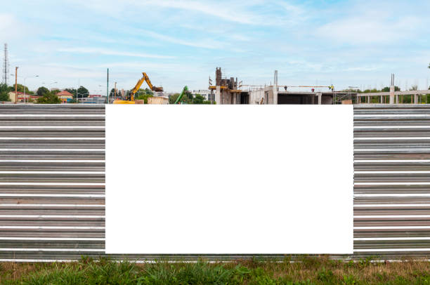 istock Blank white banner for advertisement on the fence of construction area 1397990549