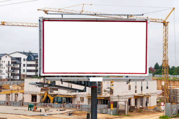 istock Blank white advertising billboard in front of the construction site 1397990662