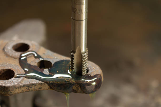 istock Cutting a thread in a hole with a tap by hand. Material high speed steel. We make an internal thread. 1397992226
