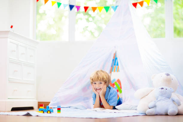 istock Kids room with teepee tent. Child bedroom. 1397993830