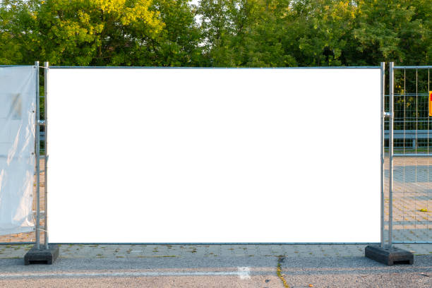istock Blank white banner for advertisement on the fence of construction site 1397994946