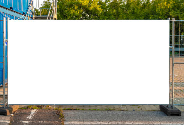 istock Blank white banner for advertisement on the fence of construction site 1397994954