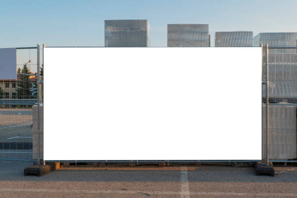 istock Blank white banner for advertisement on the fence of construction site 1397994982