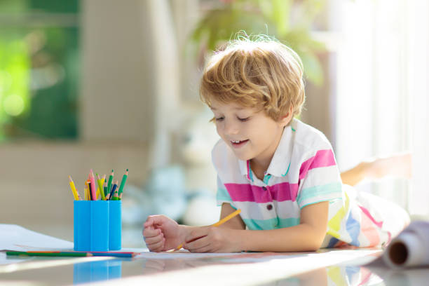 istock Child drawing. Kid painting rainbow. 1397996238