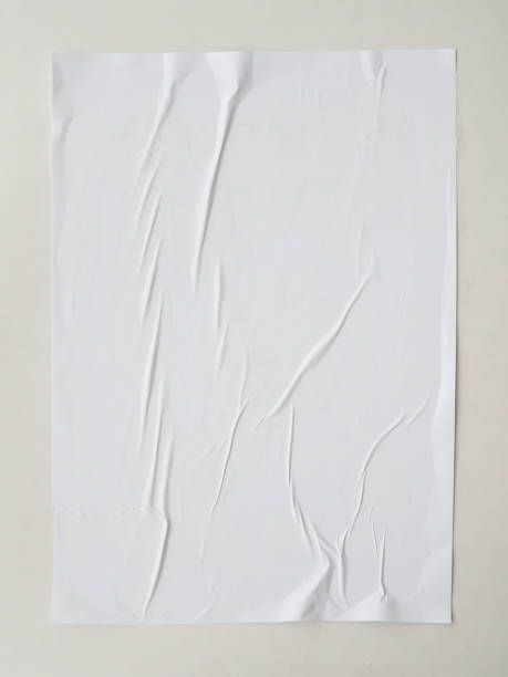 Blank white wheatpaste glued paper poster mockup on white wall background