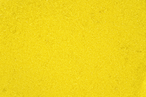 Small bright yellow crystals of sodium chromate, microscope photo, image width 17mm