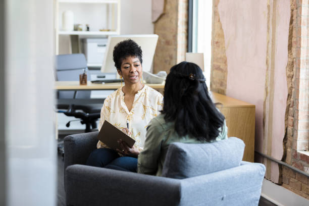 istock Therapist meets with her new patient 1398008739