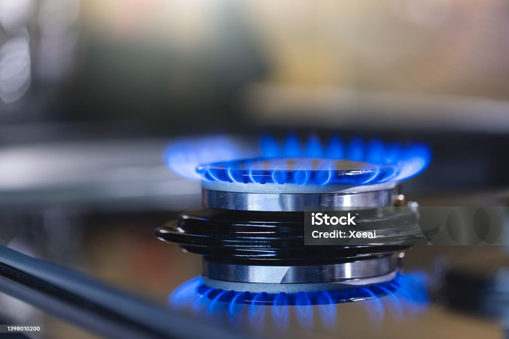 Natural gas blue flames Natural gas blue flames at kitchen Natural Gas Stock Photo