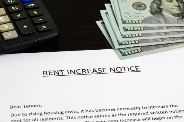 Rent increase notice. Rental assistance, housing market shortage, and monthly budget concept. stock photo