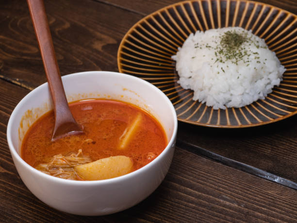 istock Spice curry and rice with potatoes and chicken. 1398011984