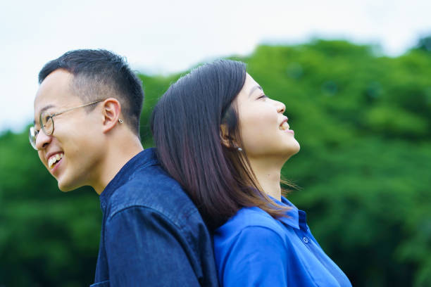 istock A young couple standing back to back 1398015981