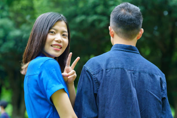 istock Young couple taking a walk with a smile 1398017157