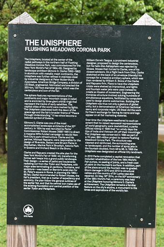 Flushing, Queens, New York, USA - May 14, 2022 - The Unisphere Information Sign in the Flushing Meadows Corona Park. The unisphere is a stainless steel structure shaped into a 3D image of the globe or earth.