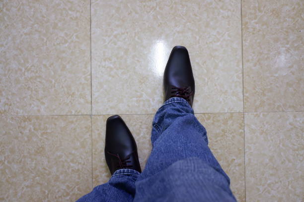 istock Men's shoe models marketing the concept. 1398019060