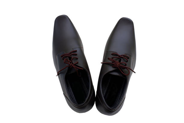istock Brown shoes are isolated on white background with a clipping path. 1398019659
