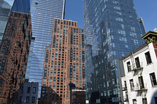 Manhattan, New York City, USA - May 15, 2022 - View of the Abington House and other skyscraper buildings from the High Line.