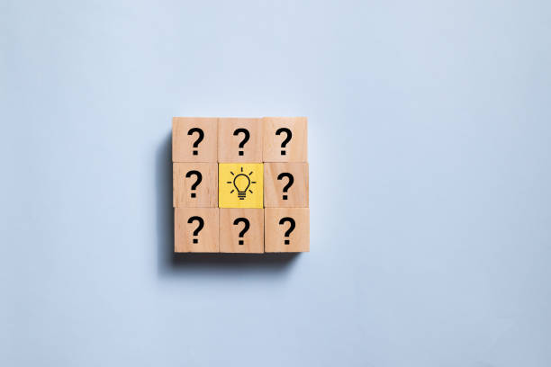 istock Top view wooden blocks set to step from question to idea. Concept for creative and design solution. 1398025761