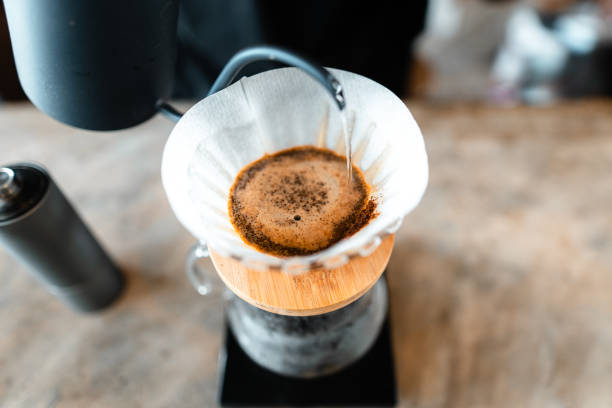 istock Drip coffee,Pouring hot water in the kettle into the coffee,brew coffee 1398029446