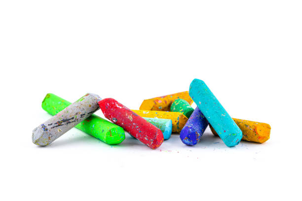 istock Used color crayons isolated on white background. 1398030413