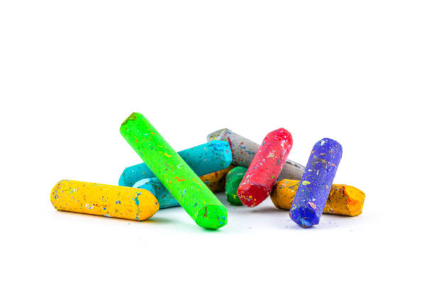Used color crayons isolated on white background.