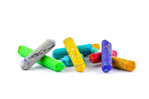 istock Used color crayons isolated on white background. 1398030424