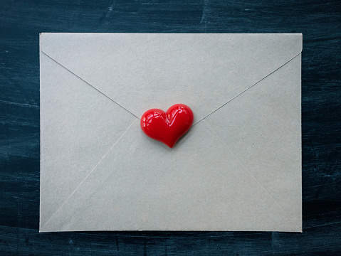 Red heart on the envelope