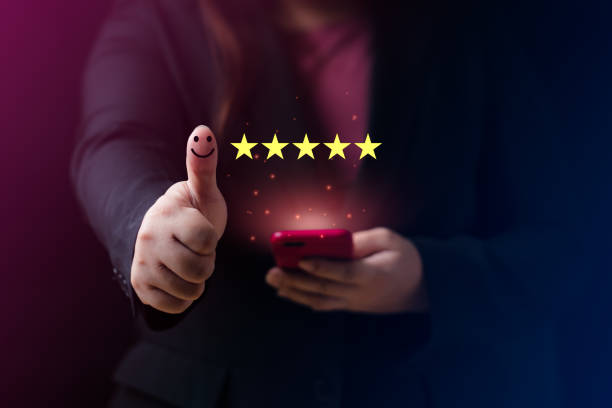 istock Customer satisfaction concept. Hand with thumb up Positive emotion smiley face icon and five star with copy space. 5 star satisfaction, Excellent business rating experience 1398031042