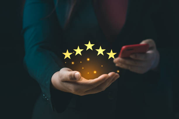 istock Customer satisfaction concept. Hand with thumb up Positive emotion smiley face icon and five star with copy space. 5 star satisfaction, Excellent business rating experience 1398031043