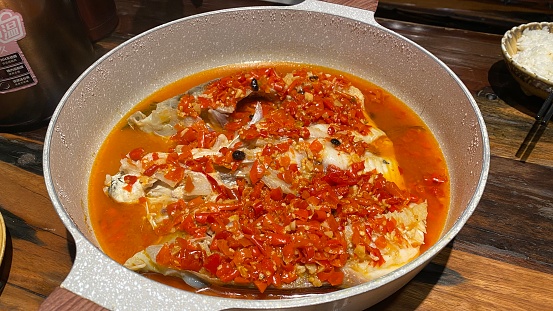 Spicy food, chili steamed fish head