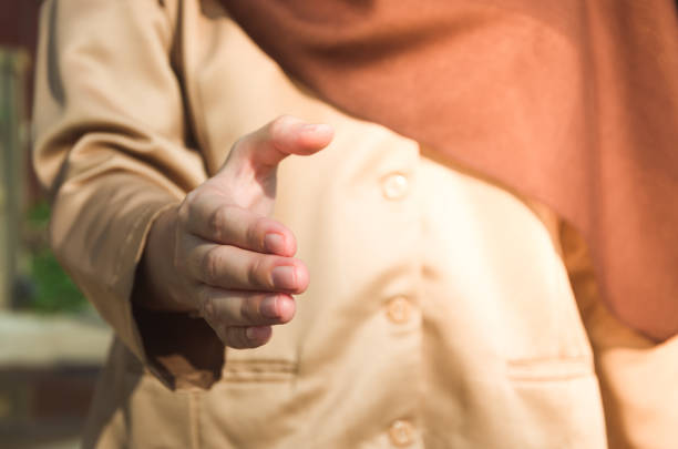 istock Scout activity agreement hijab woman greeting gesture 1398034603