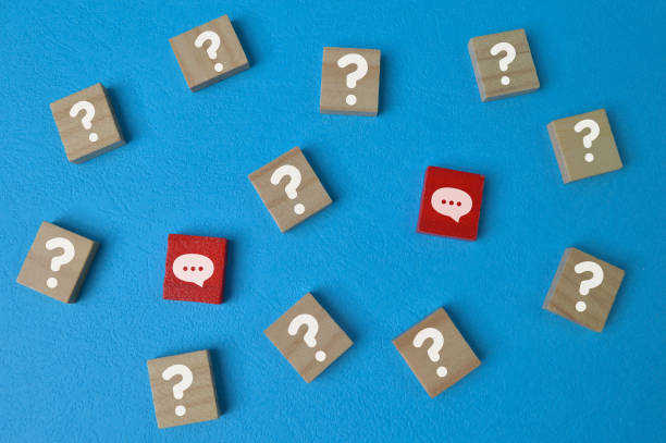 istock Wooden cube blocks with question mark and chat symbols. Q&a concept 1398036183