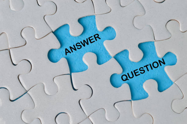 istock Top view of jigsaw puzzle with text ANSWER and QUESTION 1398036787