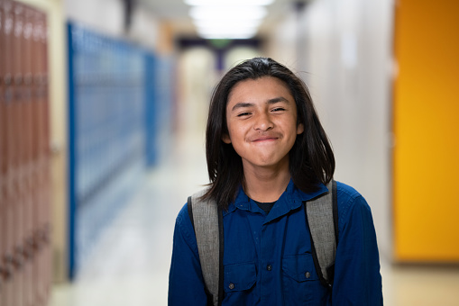 Indigenous navajo Cheerful High school teenager smiling
