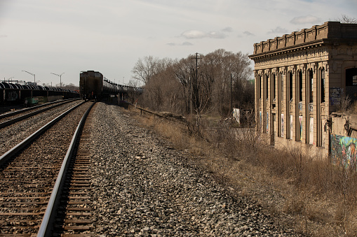 Gary, Indiana, USA - March 28, 2022: Afternoon light shines on the historic crumbling Gary Train Station.