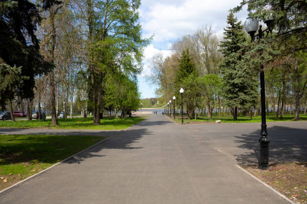 istock Spring alley on a bright sunny day.Park improvement 1398038457