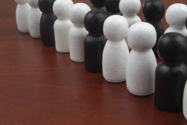 Front-Facing Chess Pieces From Enemy Sides Posed On White Studio Set