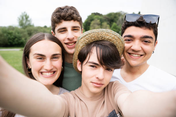 istock Camera view of teenagers taking a selfie 1398045011