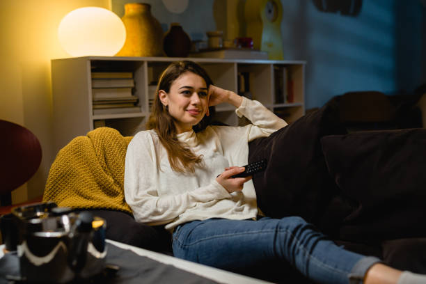istock woman relaxed at home 1398045199