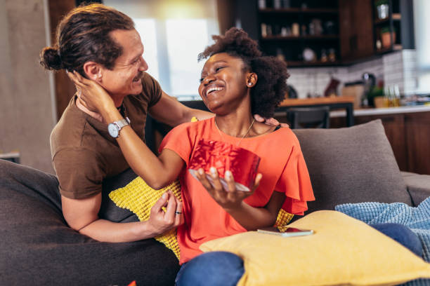 istock Man giving gift to his girlfriend. 1398052050