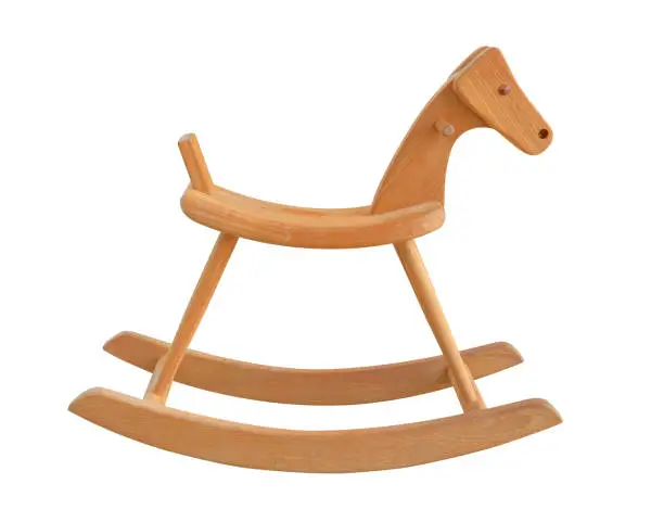 Photo of Wooden horse toy for kids to ride isolated on white background with clipping path