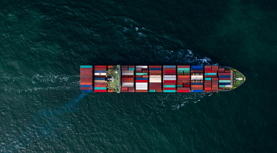 Aerial view container ship in open sea, Global business company logistic industry commerce import export logistic transportation oversea worldwide, Cargo freight shipping company vessel.