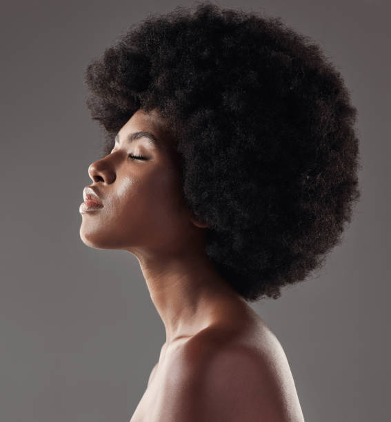 istock Studio shot of a young female posing against a grey background 1398058032