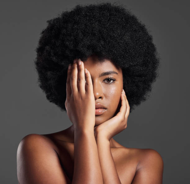 istock Studio shot of a young female posing against a grey background 1398058047