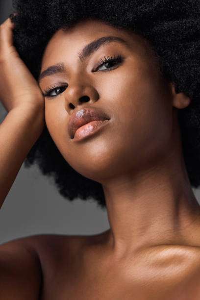 istock Studio shot of a young female posing against a grey background 1398058529