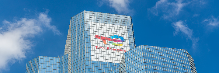 Top of the Total Energies tower, the headquarters building of the French company in La Défense, Paris