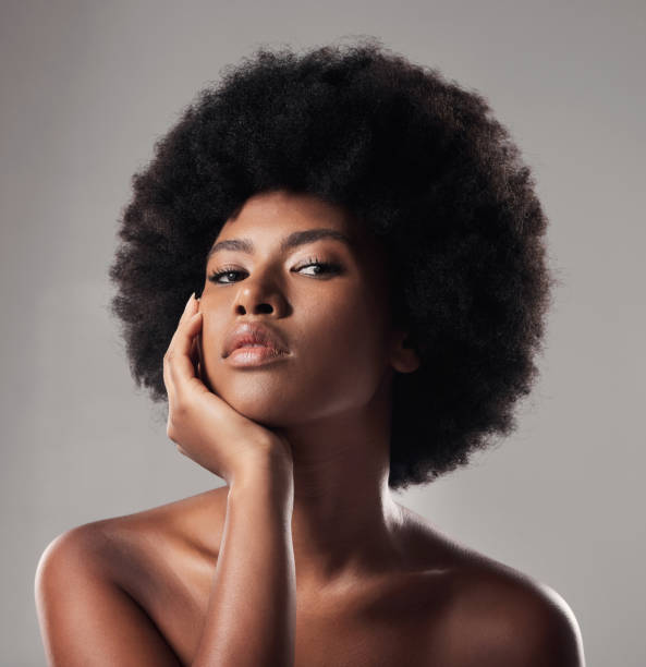 istock Studio shot of a young female posing against a grey background 1398058585
