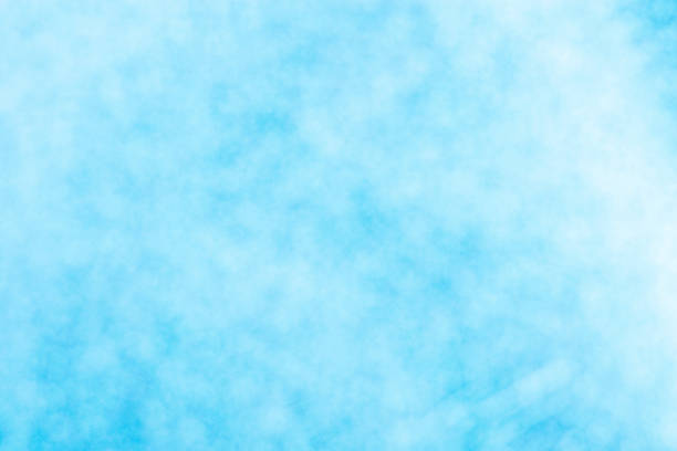 istock Blue and white bokeh lights image. Sparkling circles abstract background, defocused background 1398067018