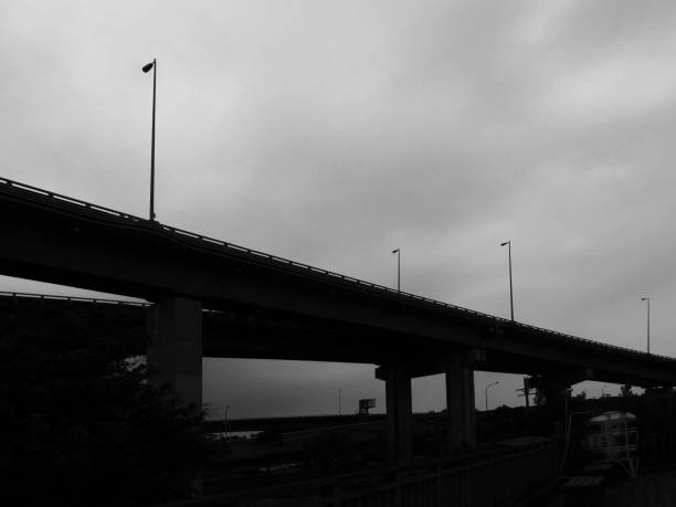 istock Black and white viaduct before the storm. Highway 1398069291