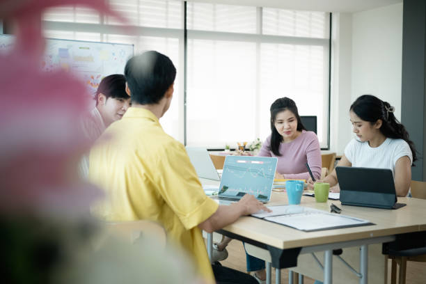 istock Startup business team brainstorming and preparing presentation for company clients or investors. 1398069446