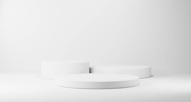 istock 3d background products Show pedestal scenes with geometric platforms white background. with podium. Stand to display cosmetic products on stage. 3D rendering. 1398069529
